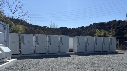 写真：熊本県宇城市にて系統用蓄電施設「NC宇城市豊野町蓄電所」需給調整市場への運用開始